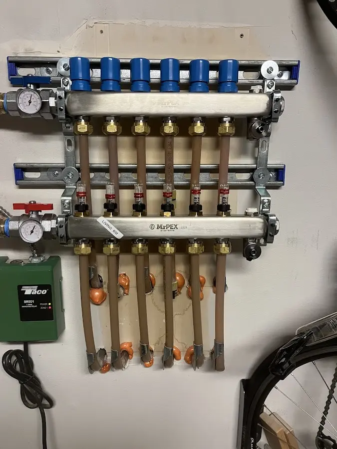 Plumber performing Water Heater Repair at a residential property in Schertz